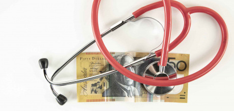 A fifty dollar note and a stethoscope