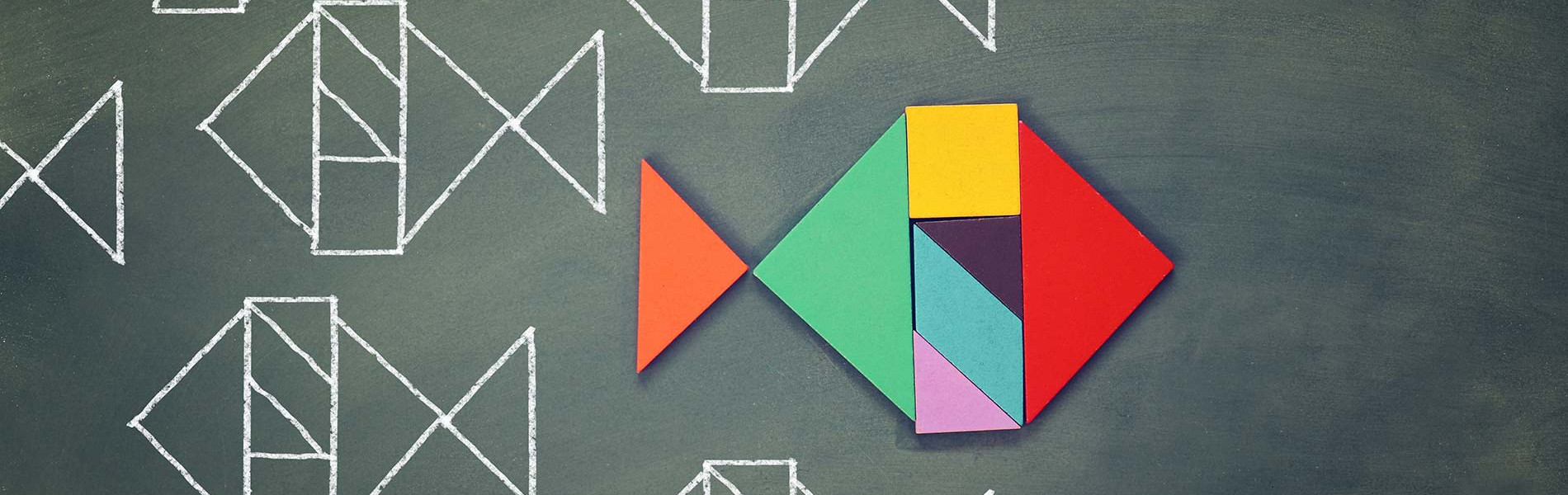 Triangular shapes drawn on a chalk board